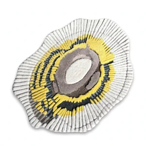 Artistic irregular oyster shell shaped tufted area rug with 3D carved radial ridges and sunburst yellow accents manufactured by China carpet factory